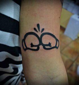 Boxhandschuhe Arm Tattoo