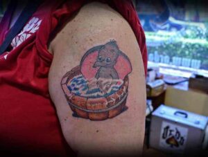 Dumbo Tattoo Motiv im Comic Stil für den Oberarm