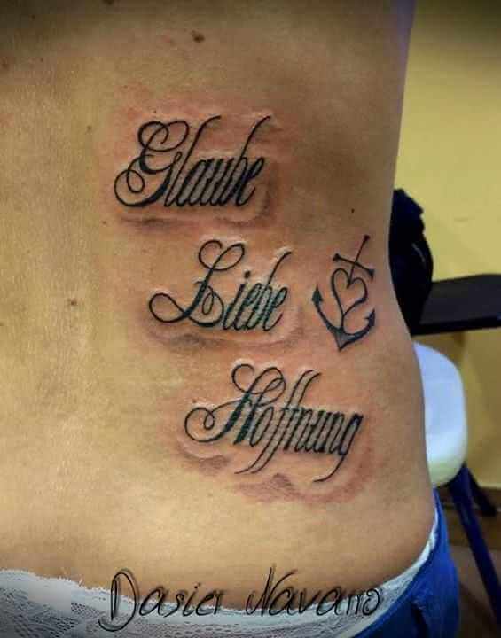 Tattoo Anker mit Herz und Schrift