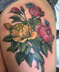 Bunte Blumen auf dem Oberschenkel