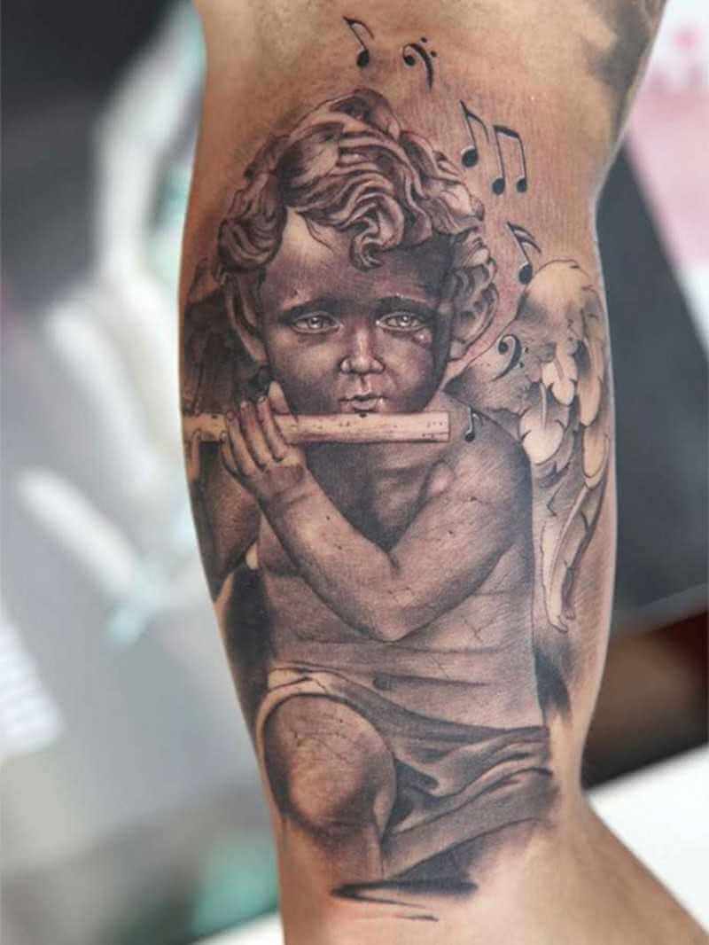Tattoo Flötender Engel