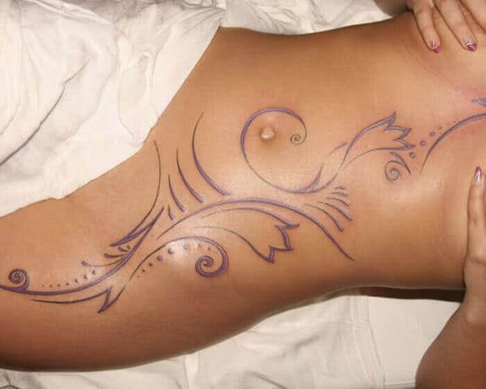 Tattoo Großes Tribal auf dem Bauch