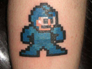Megaman Pixel Art Tattoo Motiv auf dem Unterarm