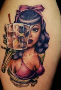 Rockabilly Frau mit Totenkopf Tattoo Idee für das Bein im Newschool Stil